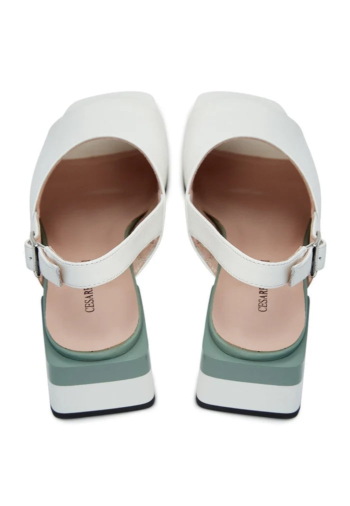A close-up image of high-quality women's leather sandals with a square heel, perfect for summer footwear fashion.
