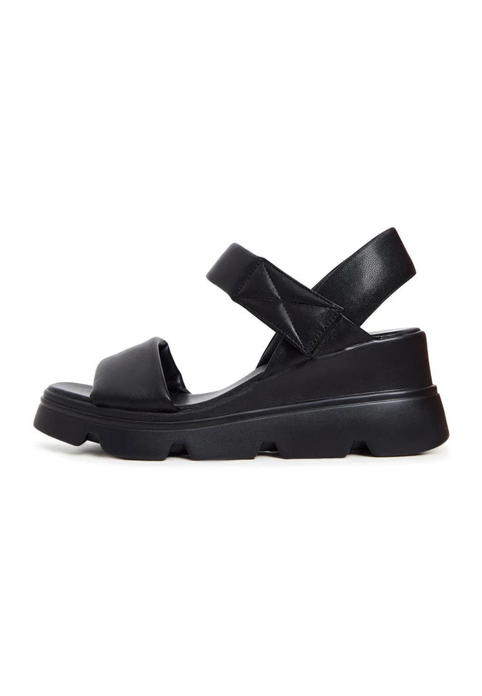 A trendy pair of leather platform sandals perfect for the urban fashionista.