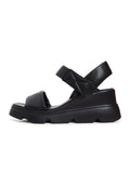 A trendy pair of leather platform sandals perfect for the urban fashionista.