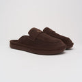 Front three-quarter view of Loafer in dark brown suede showcasing cushioned footbed and low-profile EVA sole on light gray background