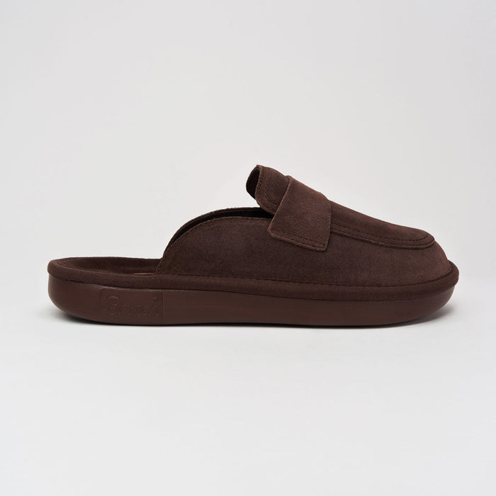 Side view of Loafer in dark brown suede showcasing open-back slip-on design and cushioned EVA sole on light gray background