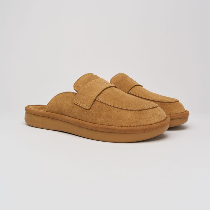 Three-quarter view of honey suede Loafer showcasing open-back mule, cushioned footbed and gum EVA outsole on light gray background