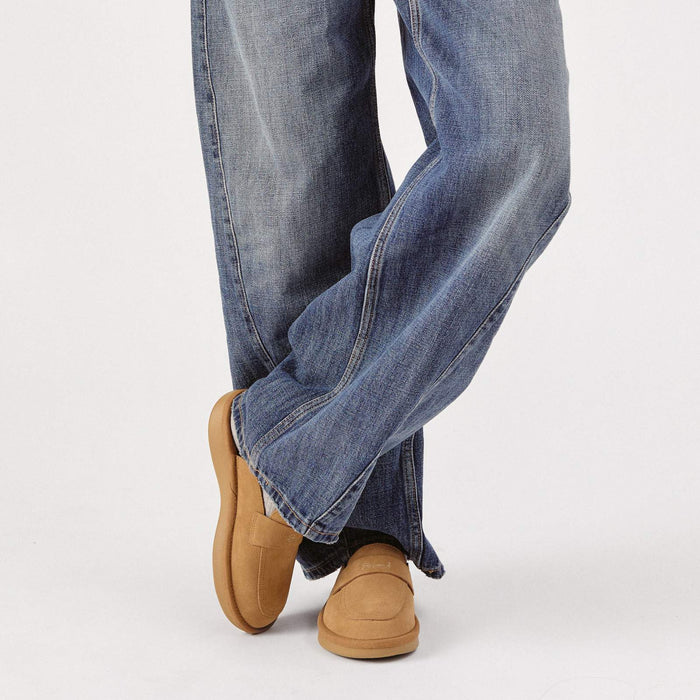 Front three-quarter view of Loafer in honey suede showcasing cushioned sole and slip-on profile on light studio background