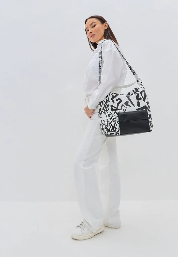 A sleek black and white monochrome handbag - perfect to buy for a stylish look.