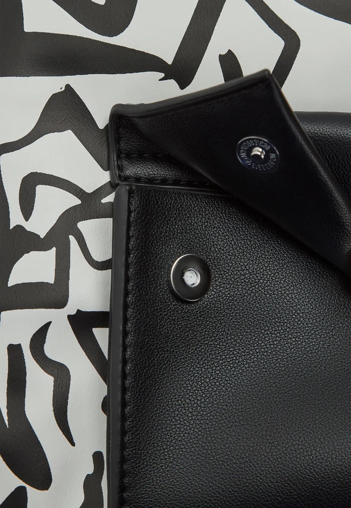A fashionable monochrome handbag for sale - buy your perfect accessory now.