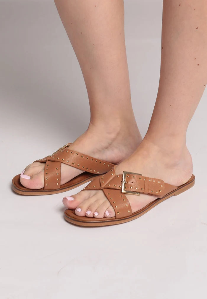 A stylish pair of women's leather open tip sandals, perfect for summer with their open toe design.