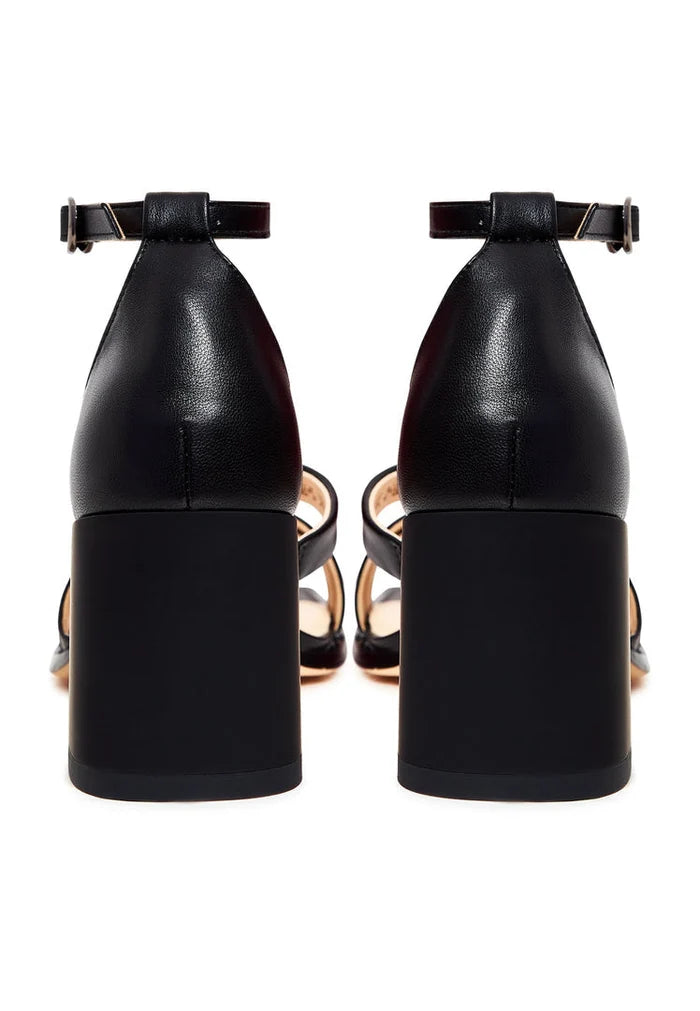 A stylish pair of black open toe sandals with a leather block heel, perfect for any fashion-forward woman's footwear collection.