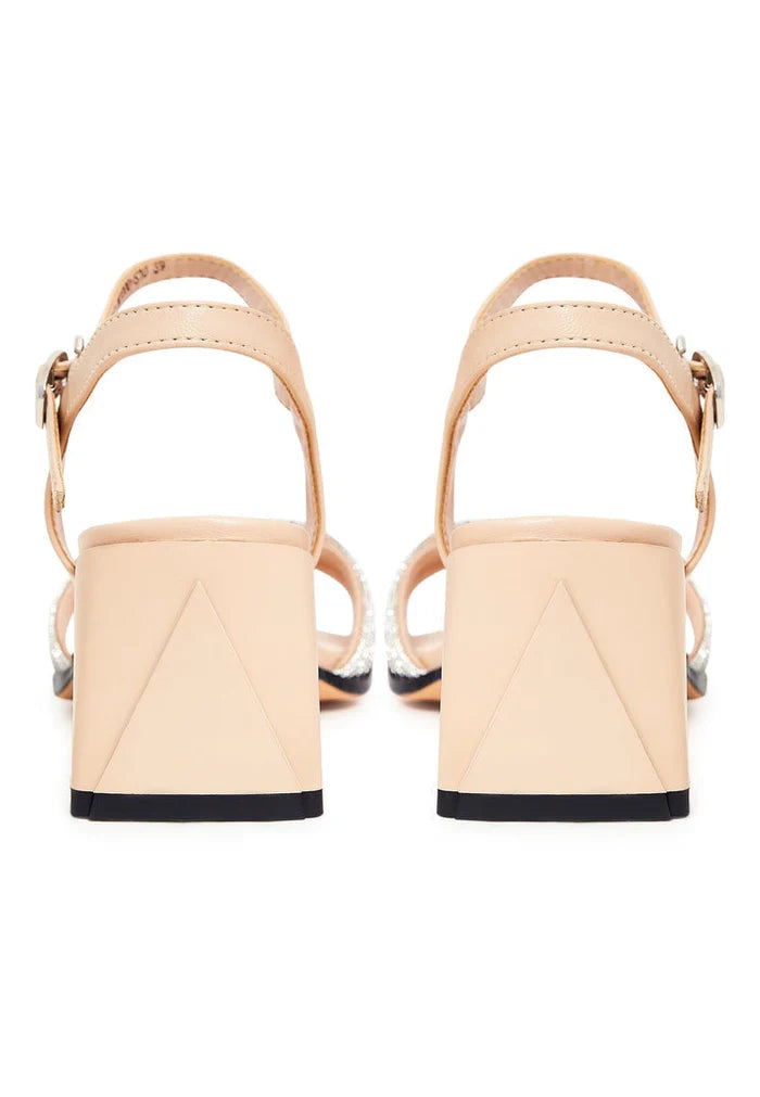 A stylish pair of beige leather block heel sandals with open toes for women by Andrea Footwear, perfect for any occasion.