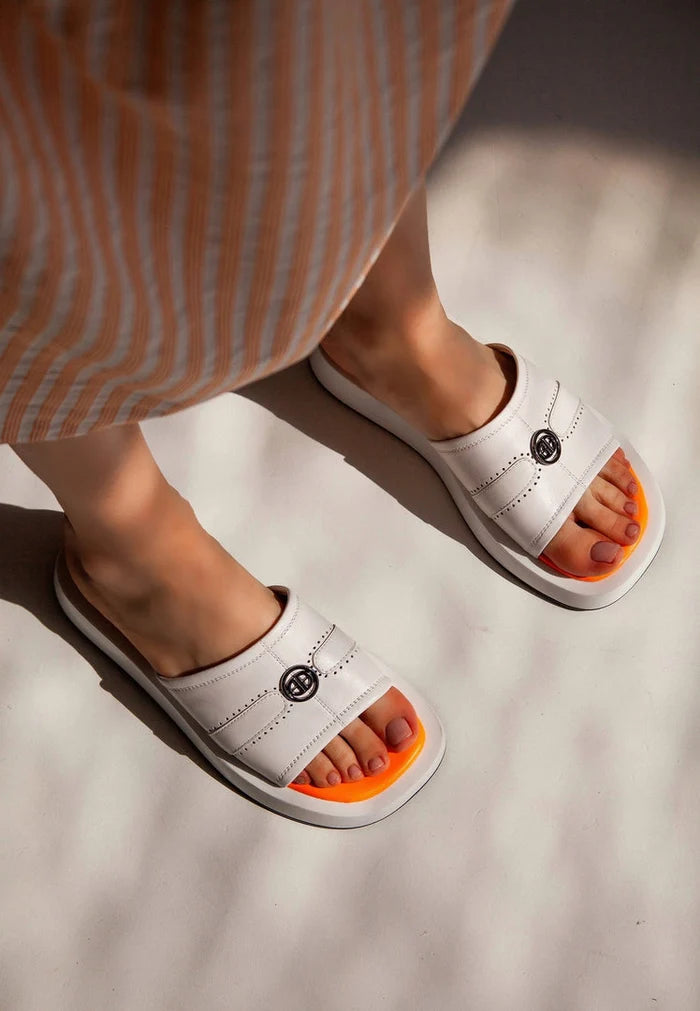 A stylish pair of designer leather open toe sandals for women, perfect for summer fashion.