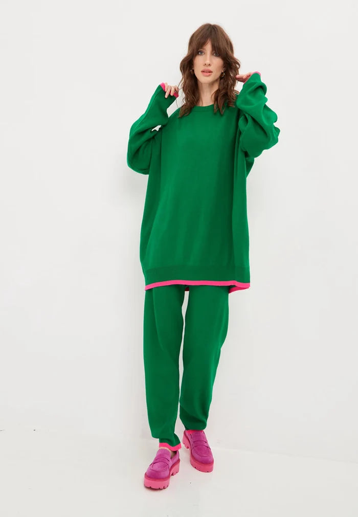 A cozy and stylish oversized green jogger set including an oversized sweatshirt and joggers, the perfect plus size jogging suit for a comfortable and trendy loungewear look.