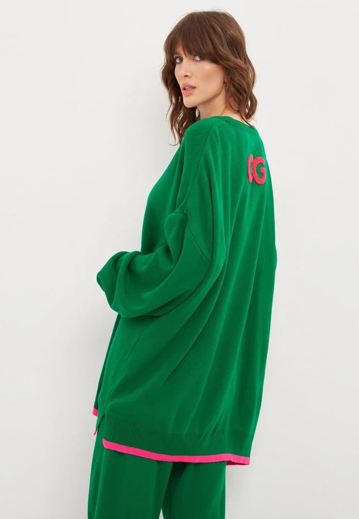 A cozy, plus size green oversized jogger set featuring an oversized sweatshirt and joggers, perfect for lounging in style.