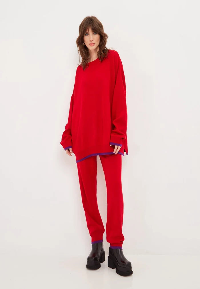 A stylish and cozy red lounge set with oversized joggers and sweatshirt, perfect for plus size activewear or a comfy athleisure outfit.