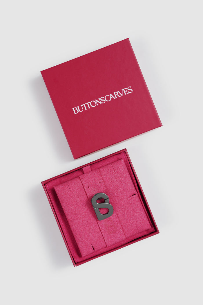 petite signature flat brooch in hematite by buttonscarves