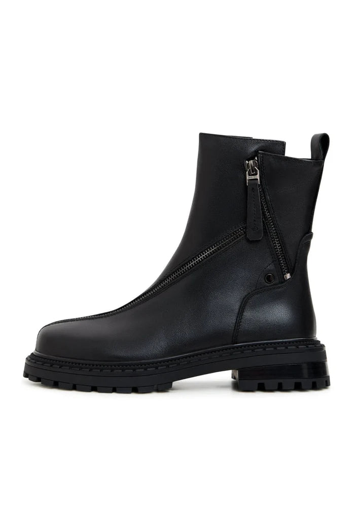 A stylish pair of black platform ankle boots crafted from genuine leather, perfect for fashionable women who love high heel boots.