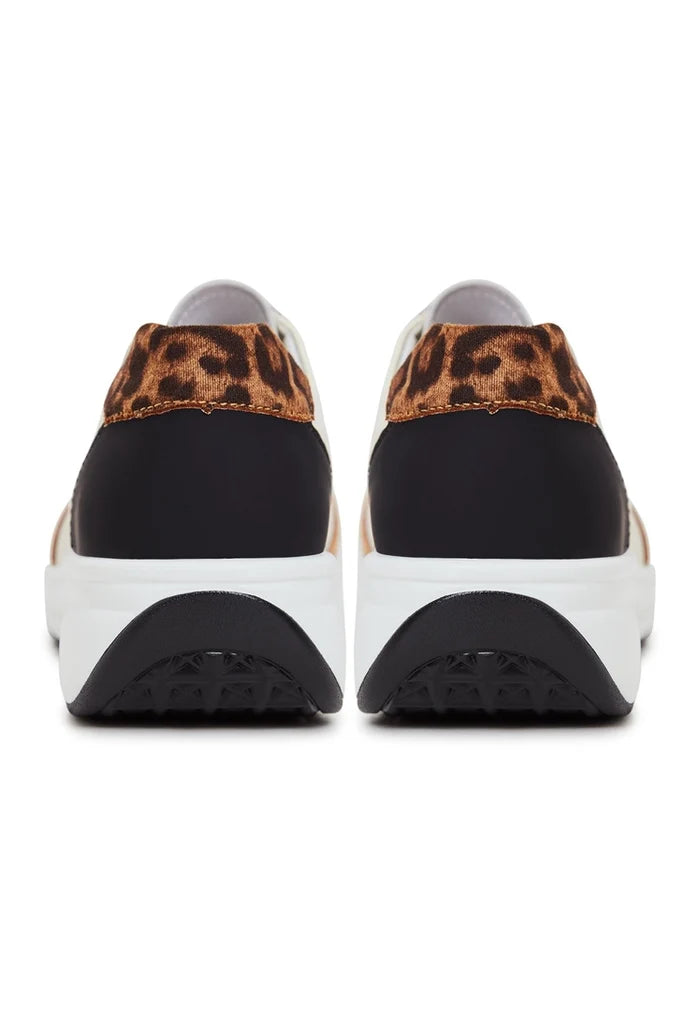 A trendy pair of women's brown platform leather sneakers, perfect for fashionable footwear enthusiasts.