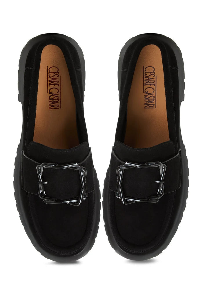 A pair of sleek black platform loafers for women, reminiscent of vintage style with a modern twist, featuring the trendy Jenny design.