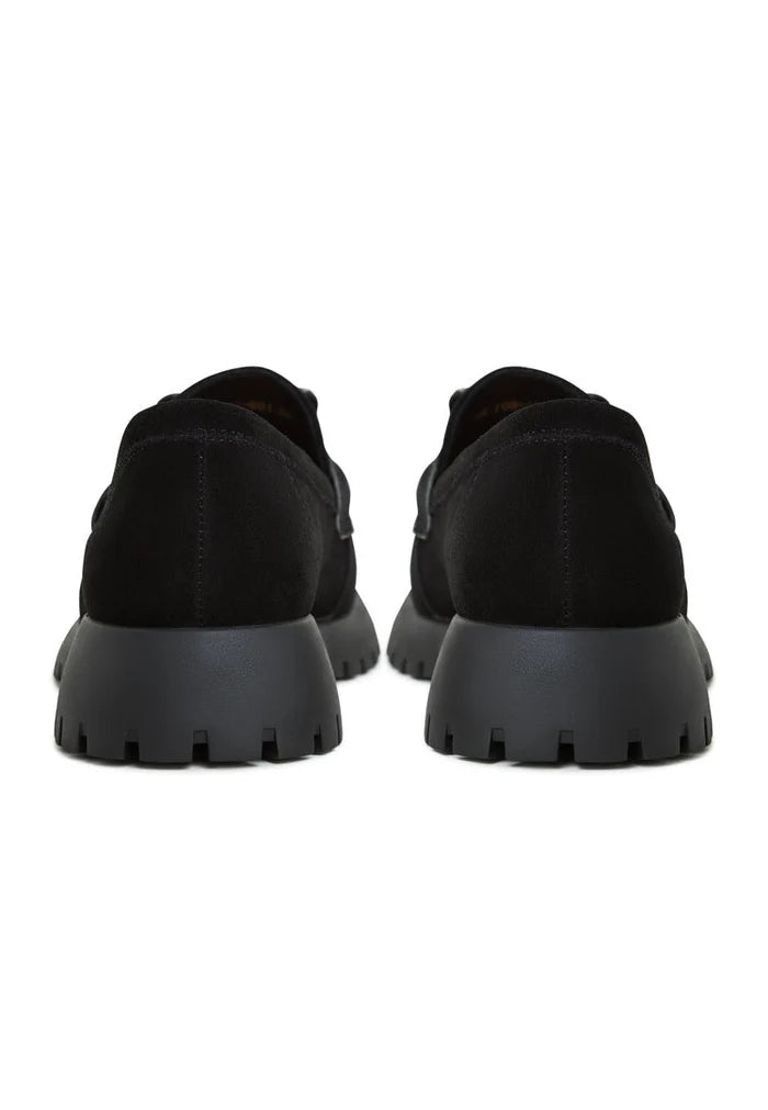A pair of black women's platform loafers - Jenny platform loafers with a vintage style design.