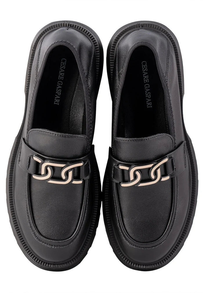 A stylish pair of black women's platform loafers by Juana, designer flats perfect for any outfit.