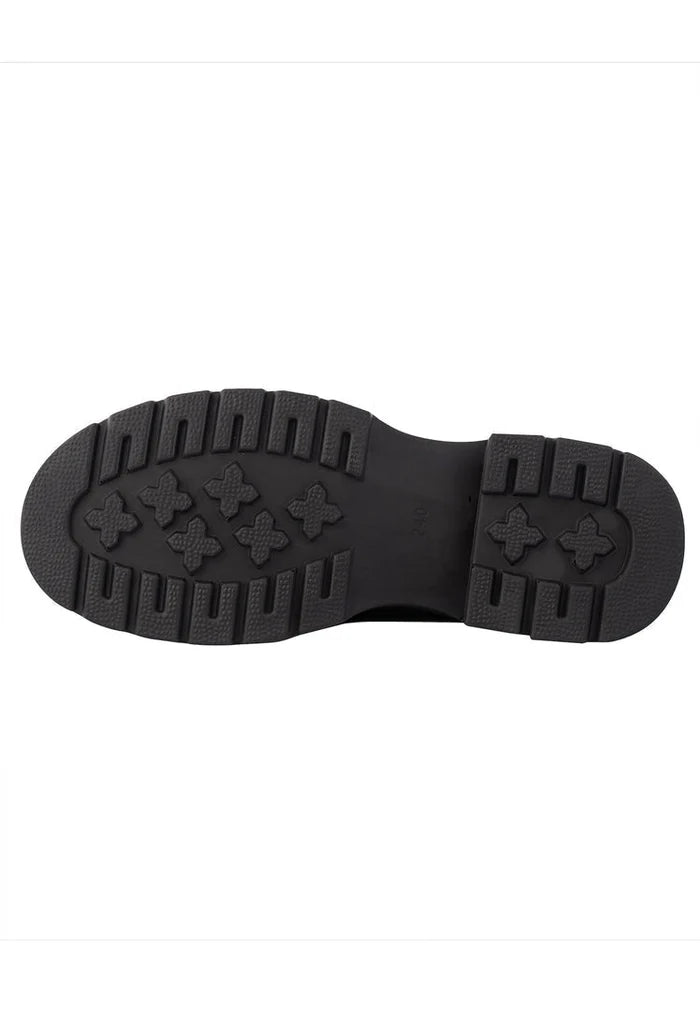 A stylish pair of black designer platform loafers by Juana, the perfect choice for women's footwear with a touch of elegance and sophistication.