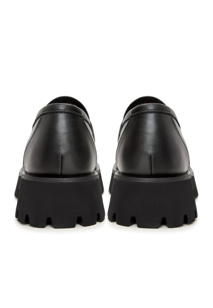 A stylish pair of black platform loafers with a chunky sole, known as Ksenia platform loafers, perfect for women's casual chic style.