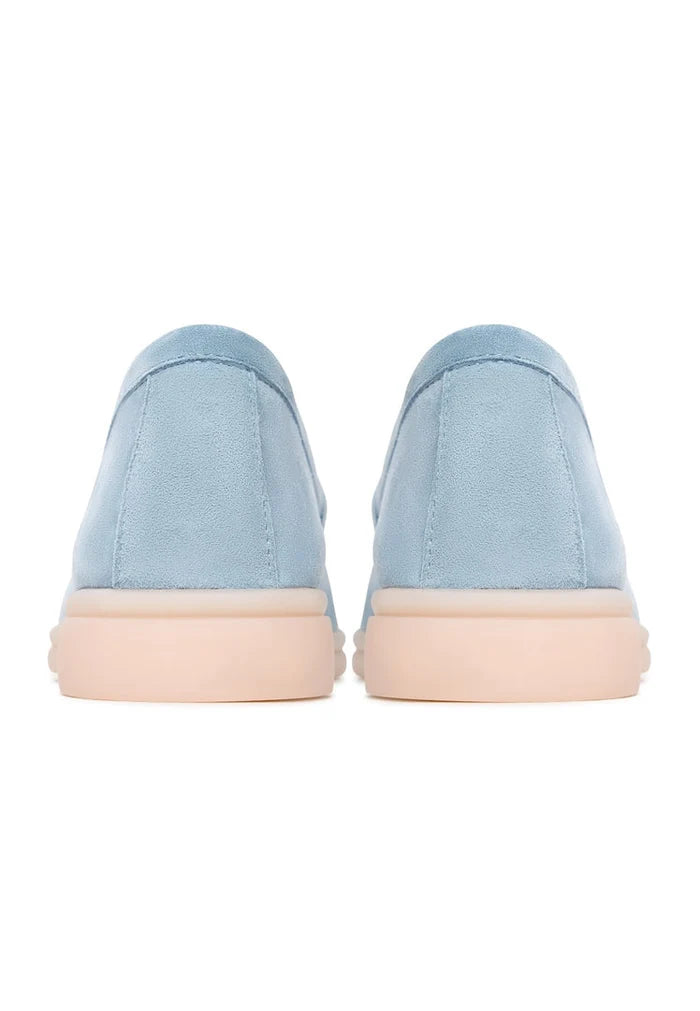 A pair of stylish blue platform moccasins by Aurelia Shoes for women.
