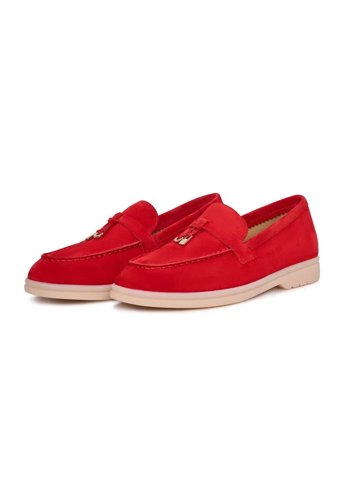 Stylish red platform moccasins, also known as Aurelia moccasins, are trendy red moccasin shoes featuring a unique platform design, perfect for those looking for fashionable platform loafers.