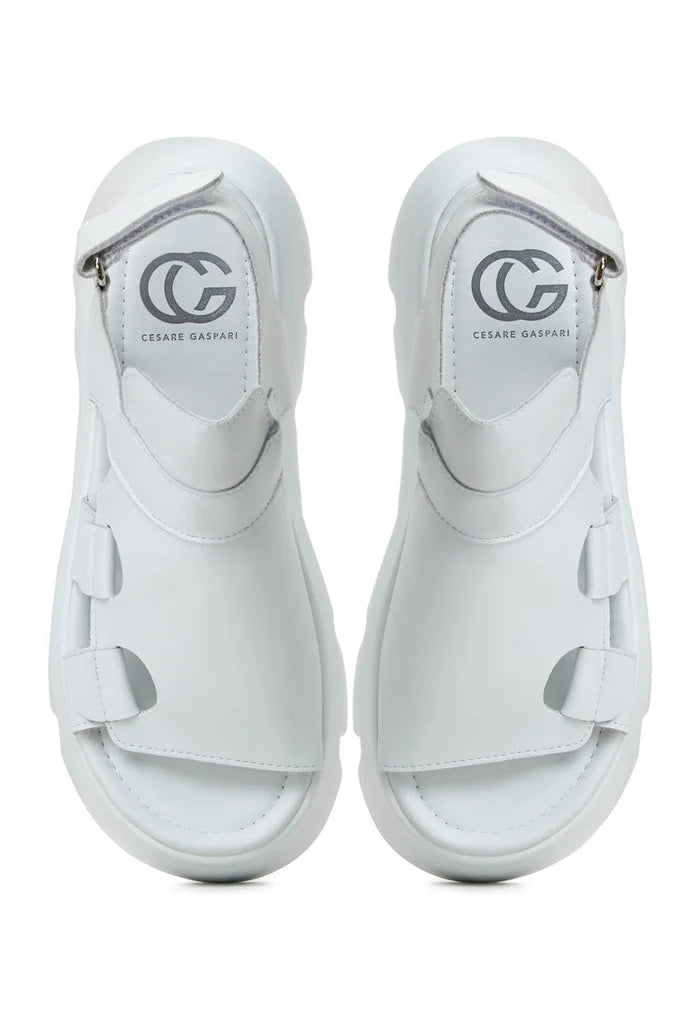 A pair of stylish white platform sandals named Amelie available for purchase online.