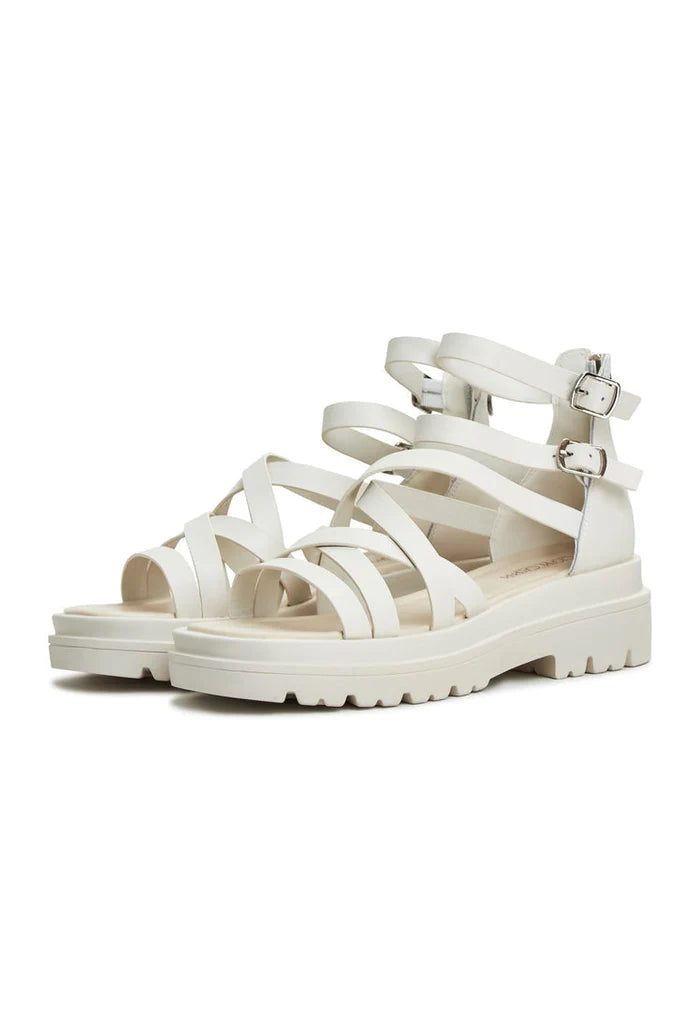 A pair of stylish white platform sandals, the Tatiana platform sandals, perfect as white wedge sandals for women with a trendy and chic design, ideal for summer outfits.