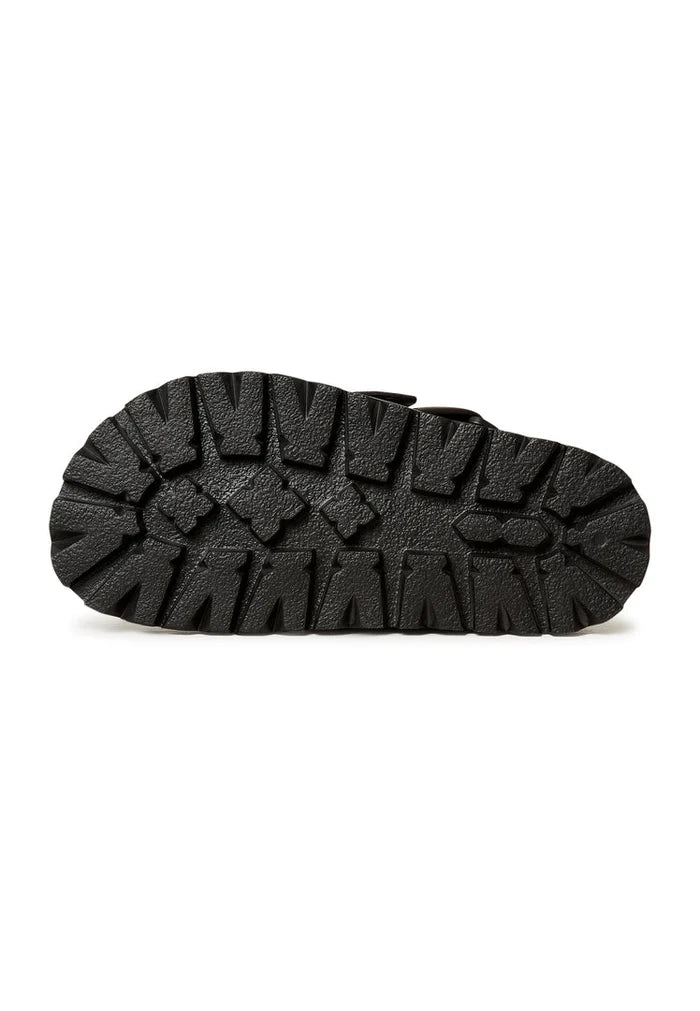 A trendy pair of Renata platform slingback slippers in black, perfect for women looking for comfortable and stylish footwear.