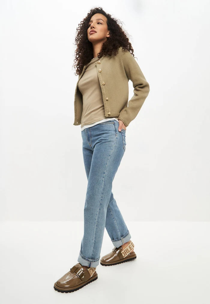 A close-up image of stylish khaki Renata platform slingback slippers for women.