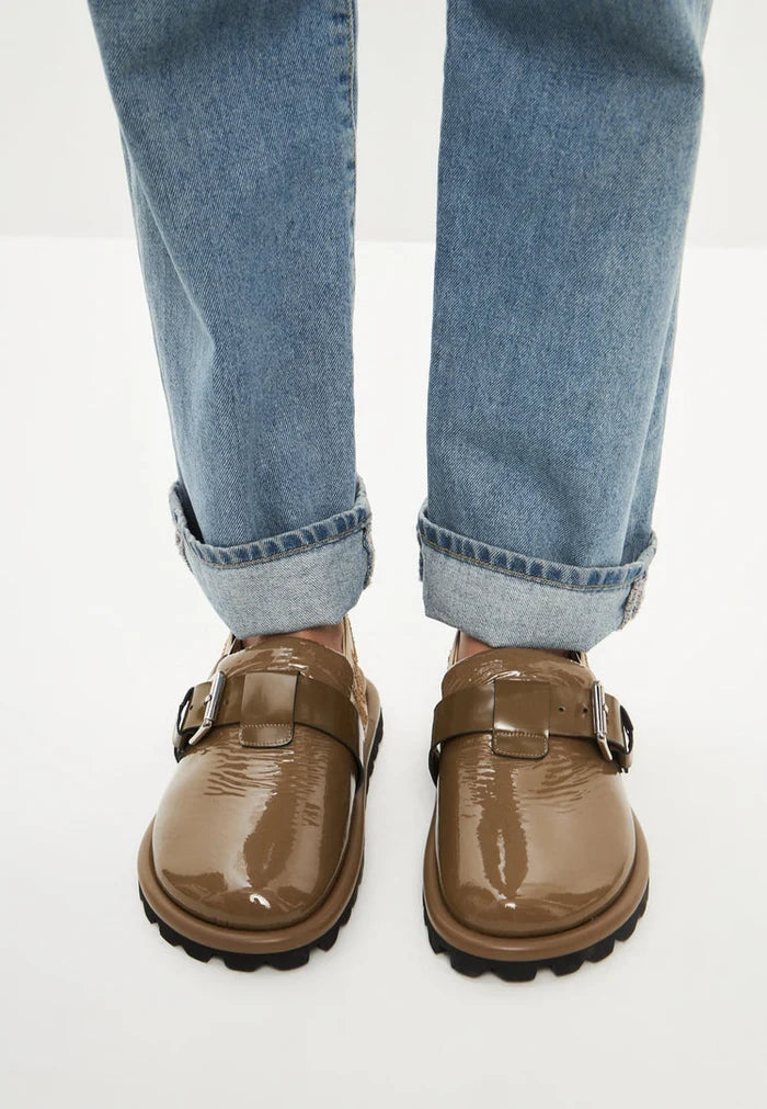 A fashionable pair of women's khaki Renata platform slingback slippers.