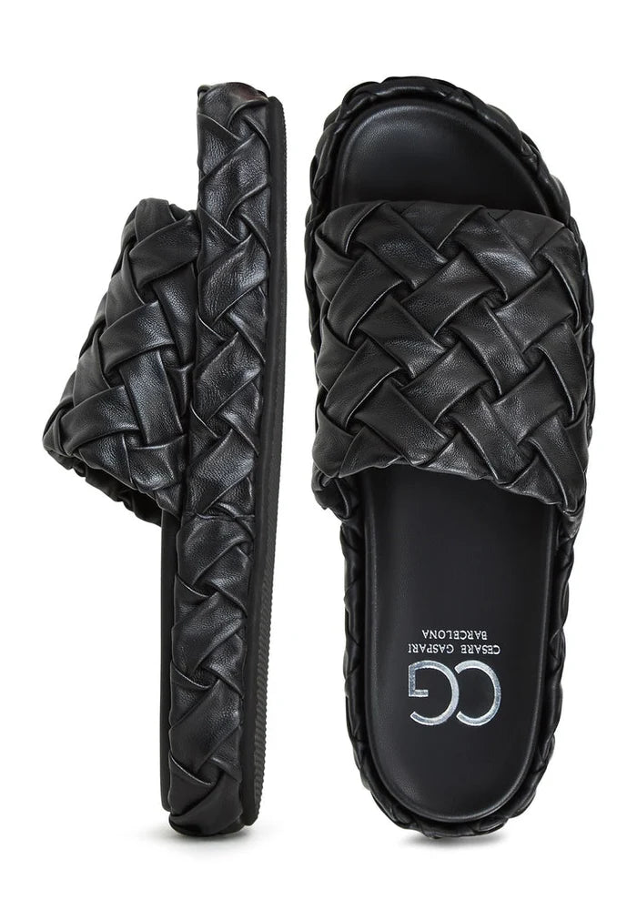 A stylish pair of Antonella Platform Slippers in black, perfect for women looking for fashionable slip-on sandals with a platform design.