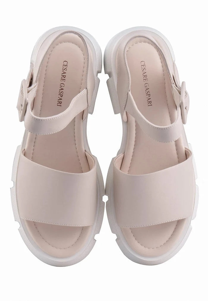 A pair of trendy chunky platform sandals with a thick elevated sole, perfect for a stylish and comfortable look.