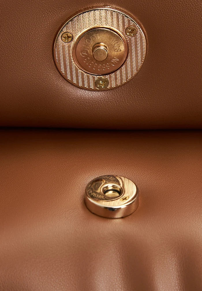 A stylish brown quilted clutch bag perfect for any outfit or occasion.