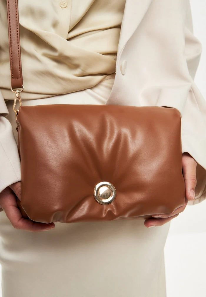 A stylish brown quilted clutch bag perfect for any outfit or occasion.