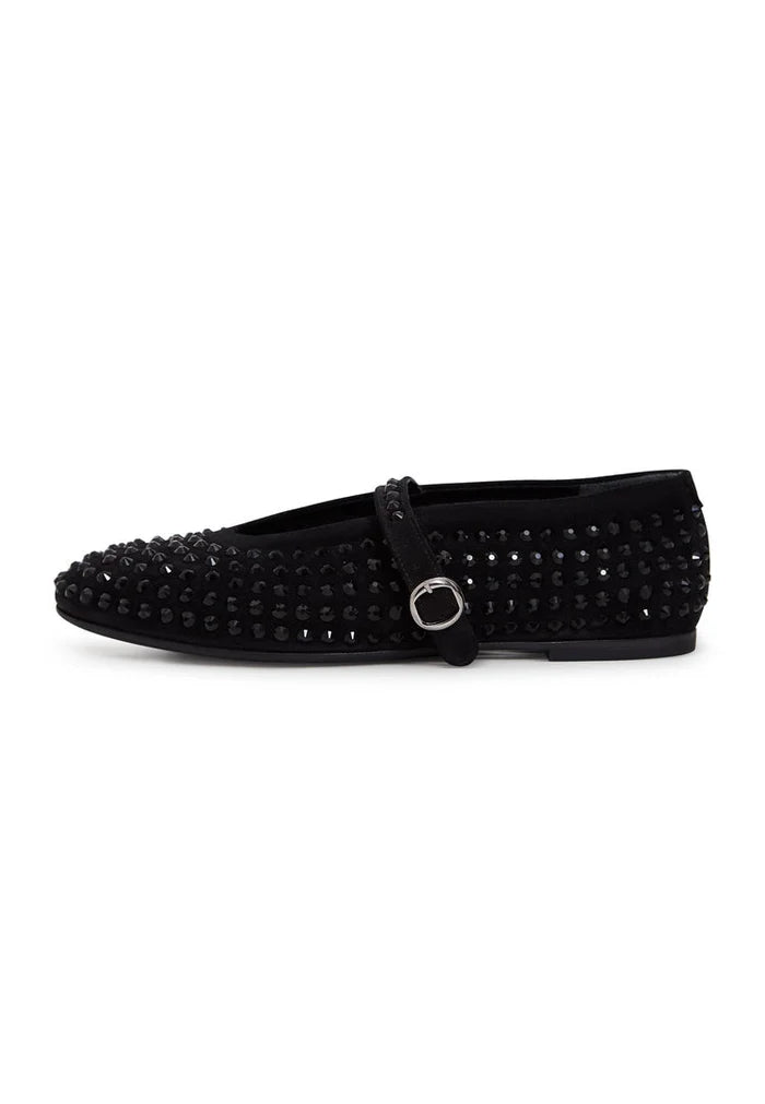 A pair of elegant black leather ballerinas with rhinestone detail, perfect for adding a touch of sparkle to any outfit. Ideal for women seeking stylish and comfortable dress shoes.