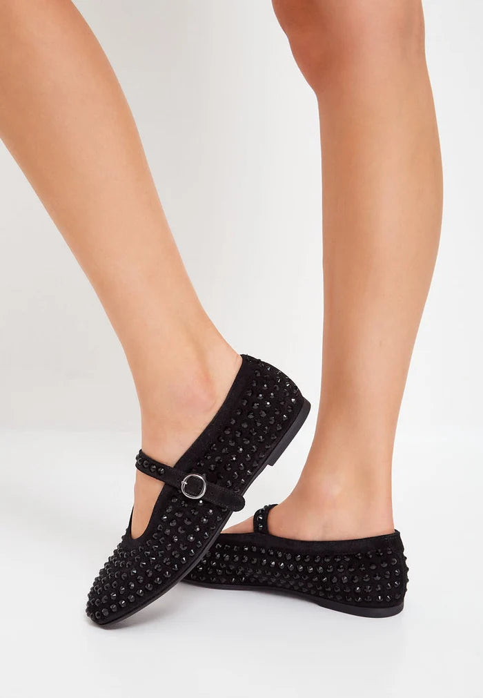 A pair of elegant black rhinestone and leather ballerinas, perfect sparkly shoes for women, ideal for dressing up any outfit.