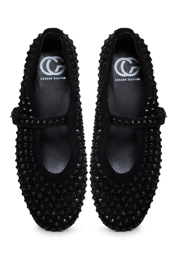 A pair of elegant black leather ballerinas adorned with shimmering rhinestones, perfect for women looking for sparkly and stylish dress shoes.