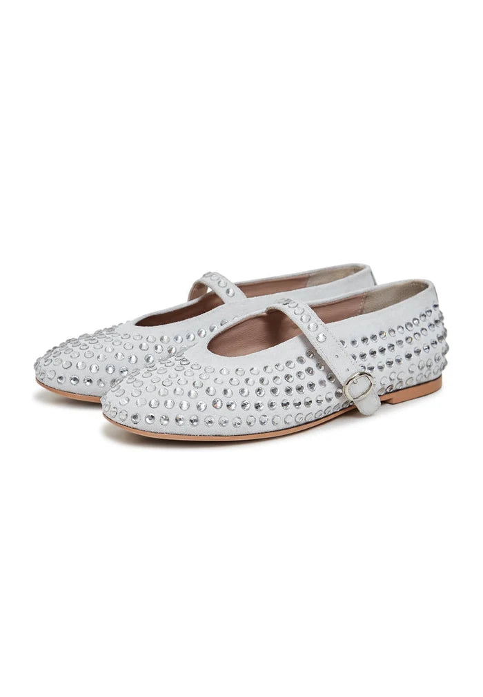 A close-up image of silver leather women's rhinestone flats, perfect for adding sparkle to any outfit.