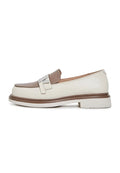 A trendy pair of beige slip-on block heel loafers for women, perfect for adding a stylish touch to any outfit.