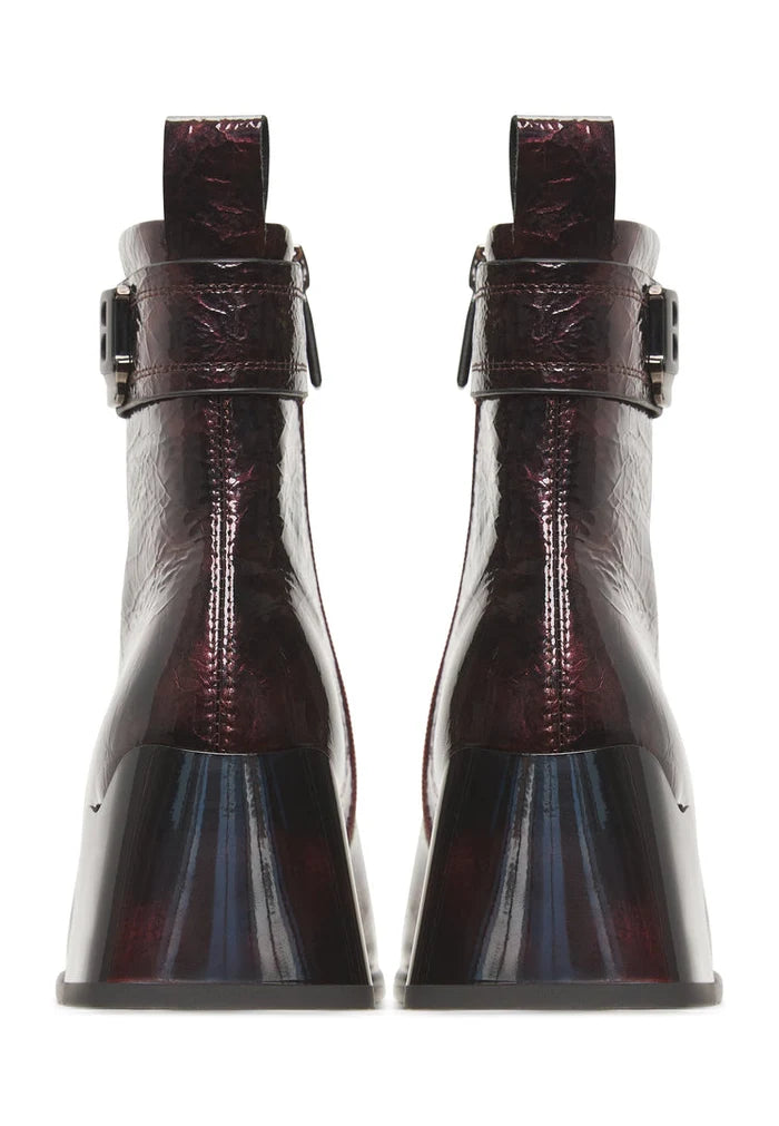 A pair of stylish women's Vika leather ankle boots in a rich Bordeaux color, creating sleek and sophisticated footwear.