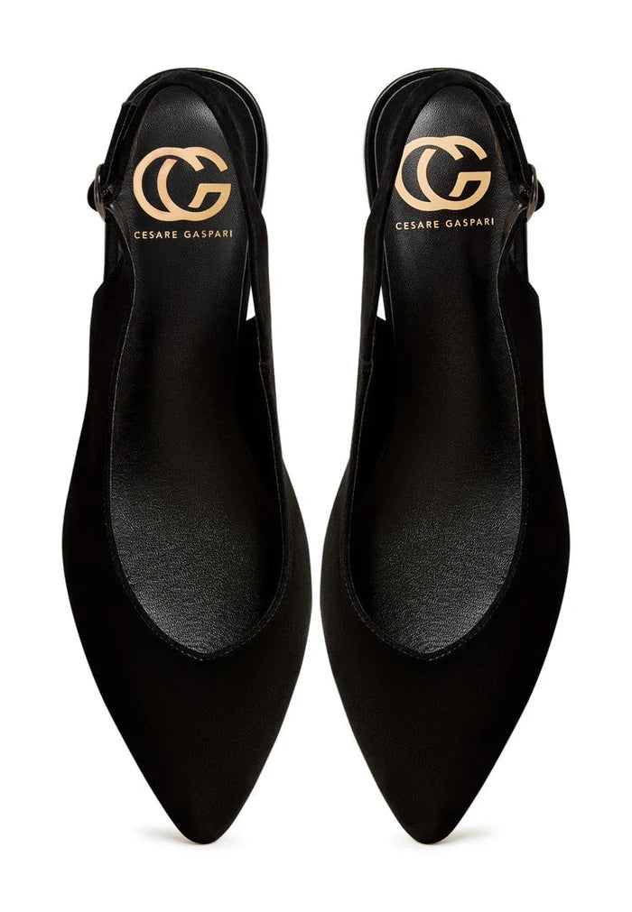 A pair of stylish black suede slingback ballerinas, perfect slip-on ballet shoes for women with a taste for trendy flats.