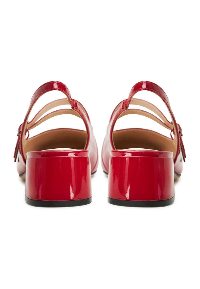 A stylish pair of women's red slingback block heels with unique Pumps Mar y Sol design, perfect for adding a pop of color to any outfit.