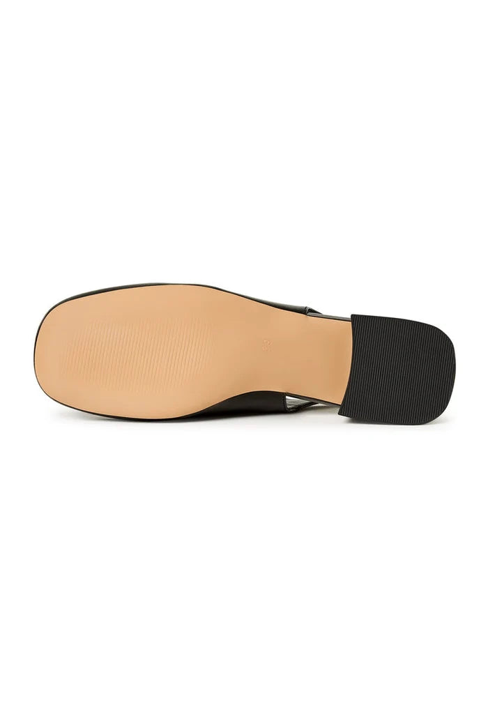 A stylish and sophisticated pair of black slingback pumps, the Irina slingback pumps, perfect for any elegant outfit with their sleek design, making them a must-have for women who love designer slingback shoes.