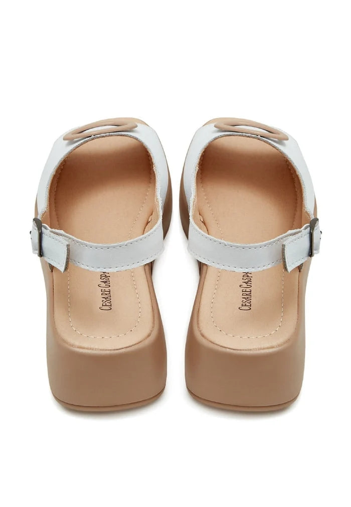 A stylish pair of white platform heel slip-on sandals, perfect for upgrading your women's footwear collection with a touch of elegance and height.