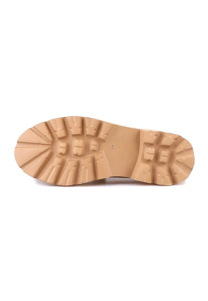 A pair of stylish slip-on suede loafers in beige color for men, perfect for adding a touch of sophistication to your footwear collection.