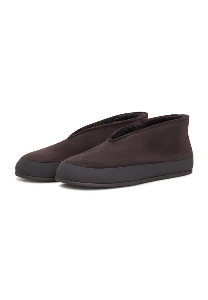 Stay warm and stylish this winter with these women's brown leather slip-on Amara winter boots.