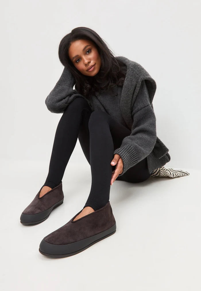 A pair of stylish women's slip-on Amara brown leather winter boots.