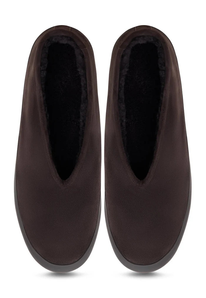 A pair of stylish brown leather slip-on winter boots, featuring the Amara style for women.