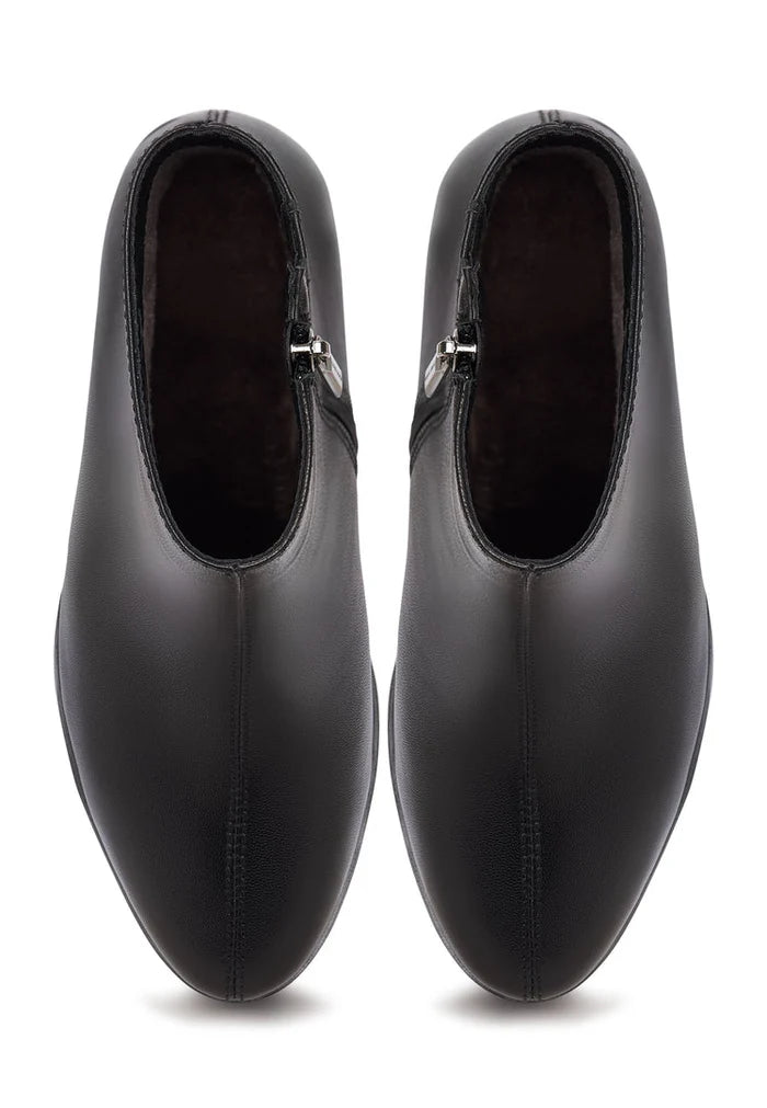 A stylish pair of women's black leather heel boots, known as Ella boots, made of soft leather.